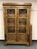 A continental walnut bookcase,