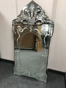 A Venetian style all glass mirror,