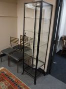 A square metal and glass display cabinet