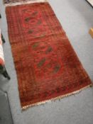 An Eastern rug on red ground
