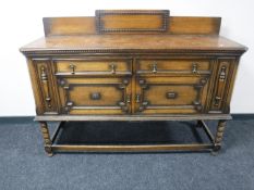 A late Victorian oak sideboard