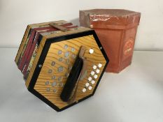 A mid 20th century German concertina in box