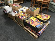 Two pallets containing helium balloons, ribbons, balloon weights,