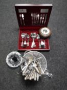 A circular oak barometer together with a part canteen of Viner's cutlery,