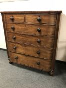 A Victorian mahogany six drawer chest,
