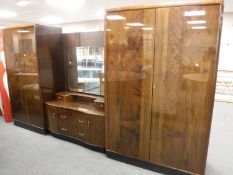 A mid 20th century three piece Golden Key Furniture bedroom suite in a gloss walnut finish