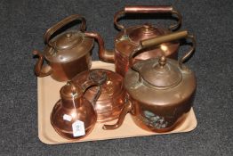 A tray of three antique copper kettles together with copper flask and bed warmer