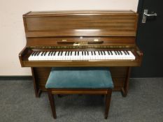 A teak cased mini piano by Millers, Cambridge, width 113 cm,