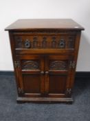 An oak Old Charm audio cabinet