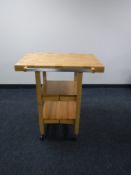 An Oasis Island pine butcher's block trolley