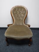 A mahogany framed spoon back lady's chair upholstered in a button dralon