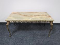 A rectangular onyx topped coffee table