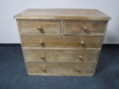 A Victorian pine five drawer chest