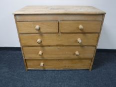 A Victorian pine five drawer chest