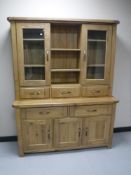 A contemporary oak kitchen dresser