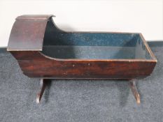 A Victorian pine rocking crib
