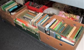 Three boxes containing a large quantity of golf interest books