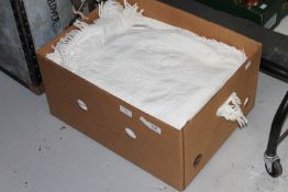 A box of three fringed throws