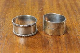 Two silver napkin rings, Sheffield 1916 and Birmingham 1959.