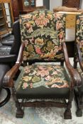 A carved oak Jacobean style armchair,