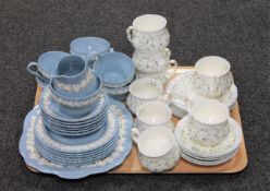 A tray of Wedgwood Embossed Queen's Ware part tea set and Royal Albert Caroline part tea set