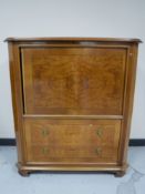 A contemporary television cabinet in a walnut finish