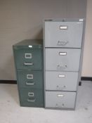 A metal filing cabinet with key and a three drawer filing cabinet