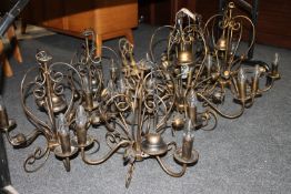 Seven contemporary metal light fittings and a brass light fitting