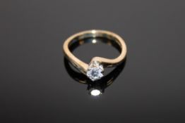 An 18ct gold diamond solitaire ring, size J, approximately 0.