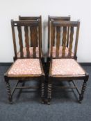 A set of four oak barley twist dining chairs