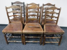 Six antique oak country ladderback dining chairs with leather seats