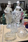 A tray of continental porcelain figures of a lady and gentleman together with two glass decanters,
