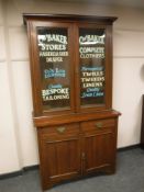 An Edwardian and later glazed bookcase 