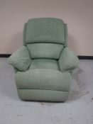 An electric reclining armchair