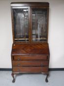 A mahogany bureau bookcase on claw and ball feet