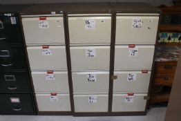 Three Bisley four drawer metal filing cabinets with keys
