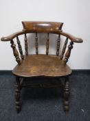 An oak captains armchair