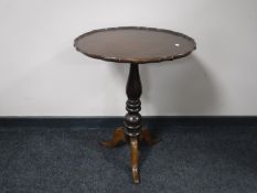 A mahogany pie crust edge wine table