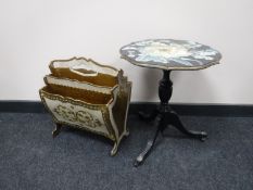 A white and gilt mag rack and a pedestal wine table