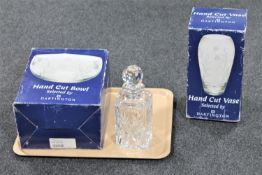 A boxed Dartington crystal vase,