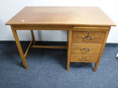 A mid 20th century teak writing desk