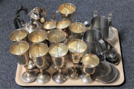 A tray of silver plated goblets,