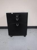 A black ash office under desk chest
