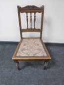 A late Victorian mahogany bedroom chair