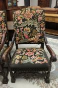 A carved oak Jacobean style armchair,