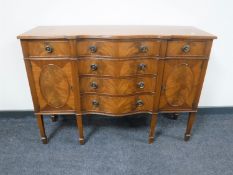 A Regency style serpentine fronted sideboard