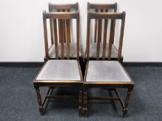 A set of four oak dining chairs