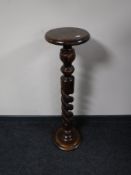 A barley twist plant stand