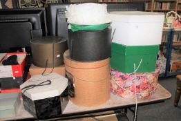 Eight boxes containing various lady's formal hats