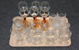 A tray of 20th century cut glass including flower vase, champagne glasses,